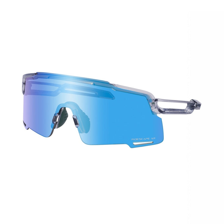 Shimano eyewear with blue lenses and mineral grey frame, 'Ridescape AR' wording, left view