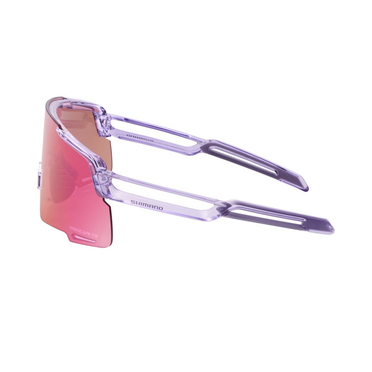 Shimano eyewear with pink lenses and transparent lilac frame, 'Ridescape TR' and 'Shimano' wording, left view