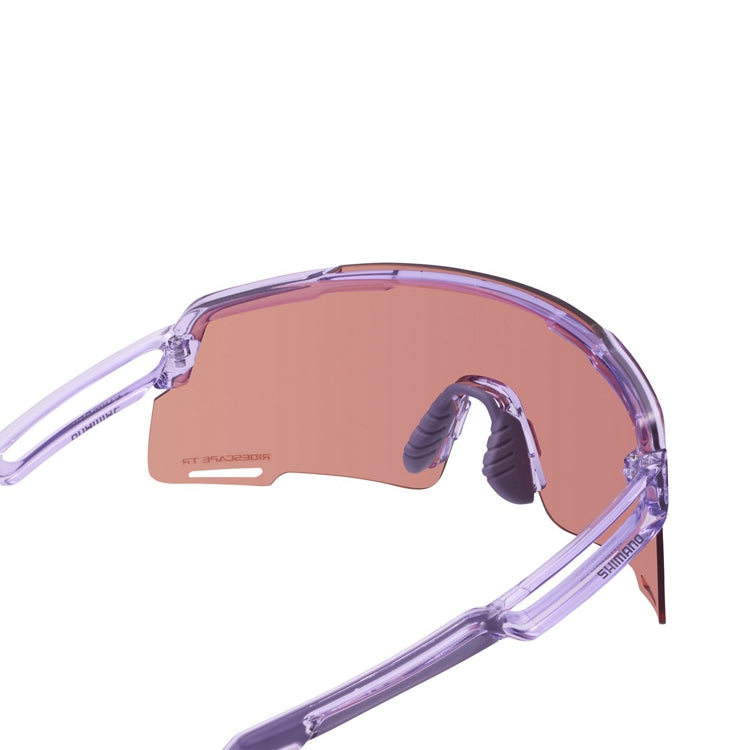 Shimano eyewear with pink lenses and transparent lilac frame, 'Ridescape AR' and 'Shimano' wording, back view