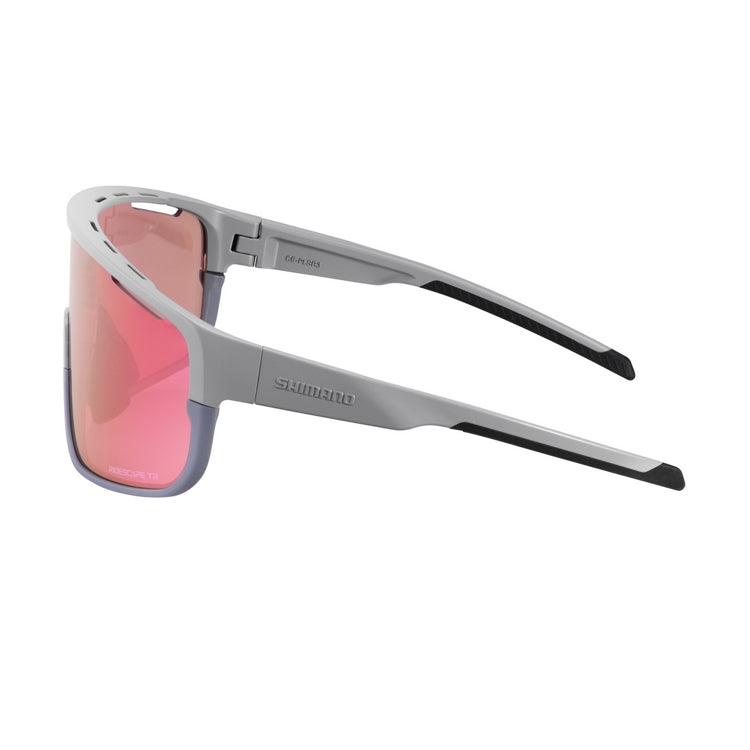 Shimano Pulsar eyewear with pink reflective lenses and frost gray frame with ridescape tr and Shimano wording, left view