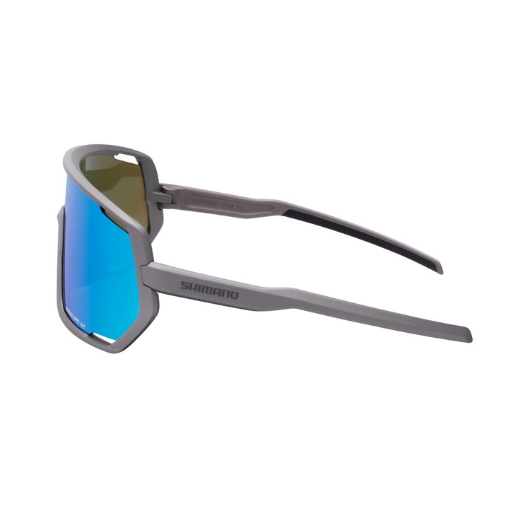Shimano Technium eyewear with blue reflective lenses and bronze gold frame with ridescape ar and Shimano wording, left view