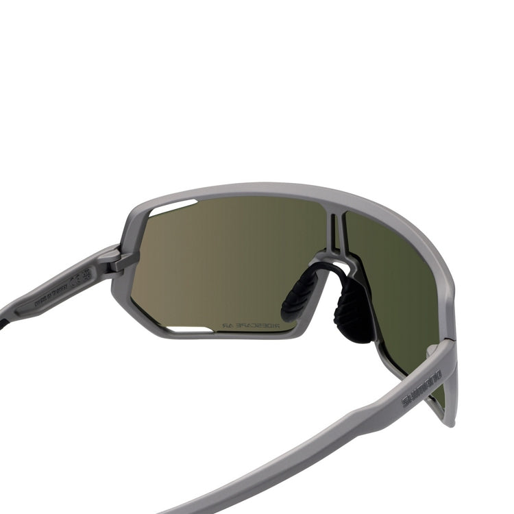 Shimano Technium eyewear with blue reflective lenses and bronze gold frame with ridescape ar and shimano wording, back view