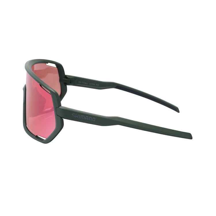 Shimano Technium eyewear with pink reflective lenses and dark olive frame with ridescape tr and Shimano wording, left view