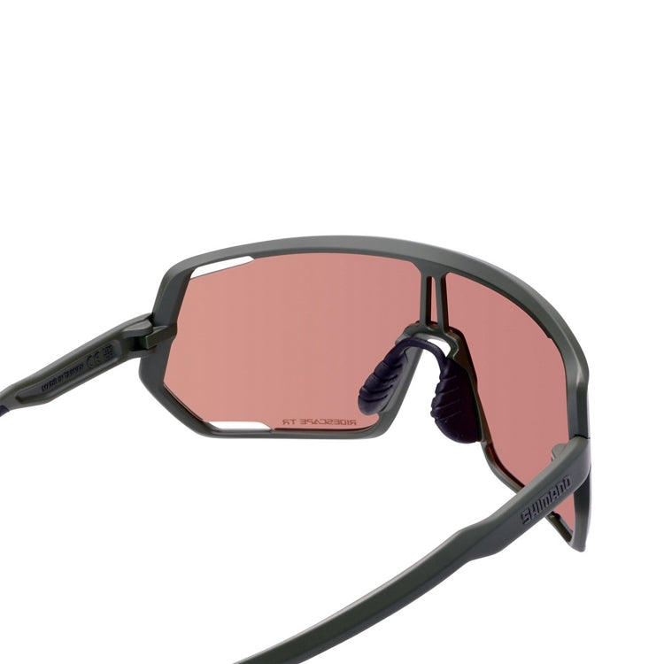 Shimano Technium eyewear with pink reflective lenses and dark olive frame with ridescape tr and Shimano wording, back view