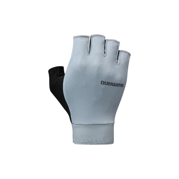 Fingerless cycling glove shown from the backhand side, featuring a light gray breathable mesh upper, black side panel, and matching light gray cuff. The glove has short finger openings with reinforced edges and a subtle “Shimano” logo printed on the back. Displayed against a light gray background.