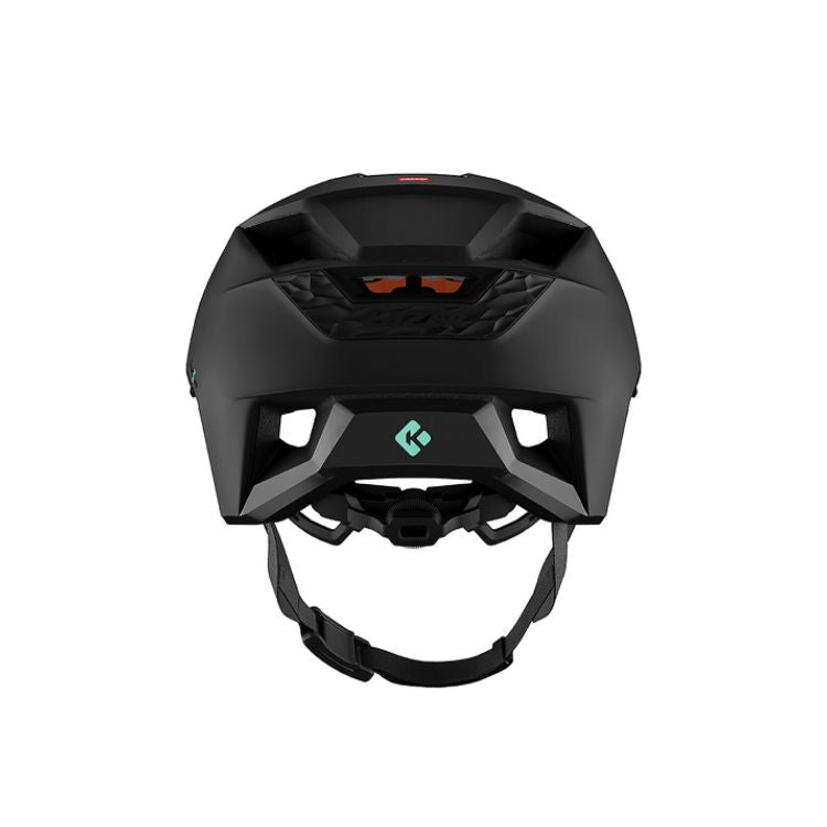 Rear view of a matte black mountain bike helmet featuring large rear ventilation ports, angular shell construction, an adjustable fit retention dial, and hanging chin straps, displayed against a light grey background.