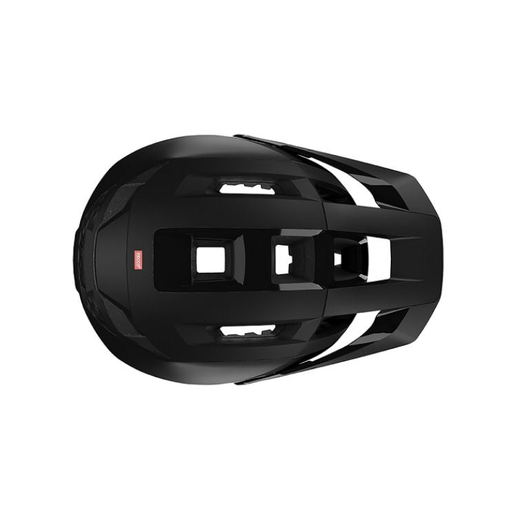 Top-down view of a matte black mountain bike helmet showing an extended visor, multiple airflow channels, large ventilation openings, and a streamlined trail-riding design on a light grey background.