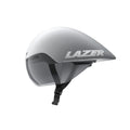 Side view of an aerodynamic cycling time-trial helmet in a matte white and silver finish. The helmet features an extended teardrop-shaped rear profile, an integrated tinted visor covering the eye area, and an adjustable black chin strap. The brand name “LAZER” appears in large silver lettering on the side. Shown against a light gray background.