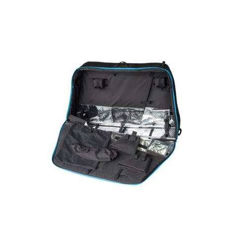 Open black bicycle travel bag with bright blue trim, showing a padded gray interior lined with reflective silver panels. Multiple straps, pockets, and securing compartments are visible for holding a bicycle frame, wheels, and accessories during transport.