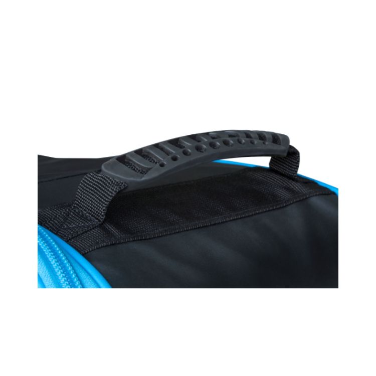 Close-up of the reinforced carry handle on a black bicycle travel bag with bright blue trim. The ergonomic black plastic grip is attached with durable woven straps, highlighting the bag's carrying and transport features.