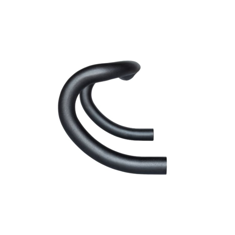 Close-up of the drop section of a black road bicycle handlebar on a light gray background. The image highlights the smooth, rounded curvature of the drop and the matte black finish, emphasizing the ergonomic shape for hand positioning.