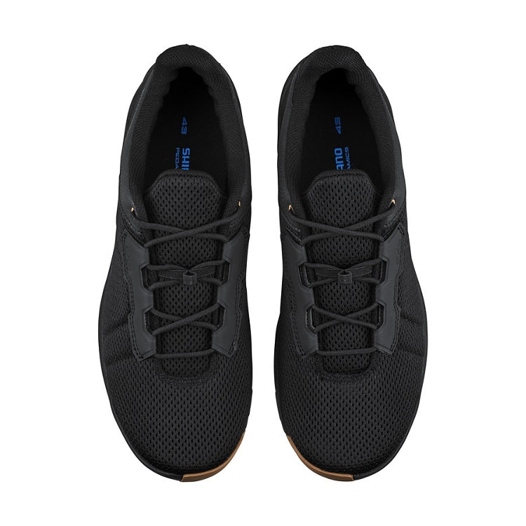 A pair of black cycling shoe, black laces, top view