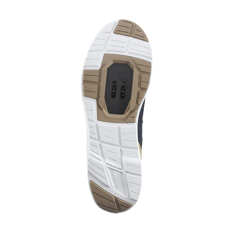 Close up of white and beige rubber sole, SPD, bottom view