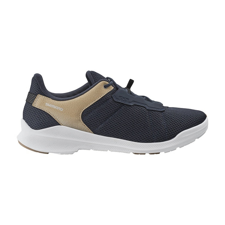 Navy cycling shoe with beige accents, navy laces, Shimano logo, white rubber sole, right view
