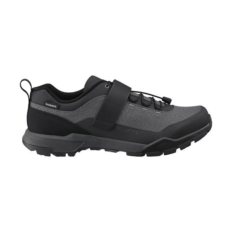Black shoe with a strap, Shimano logo, black rubber sole, right view