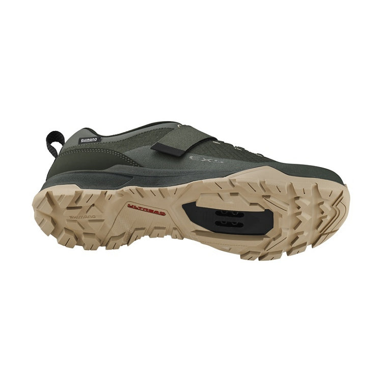 Olive shoe with a strap, Shimano logo, light brown and olive sole, 'Ultread' branding, bottom view