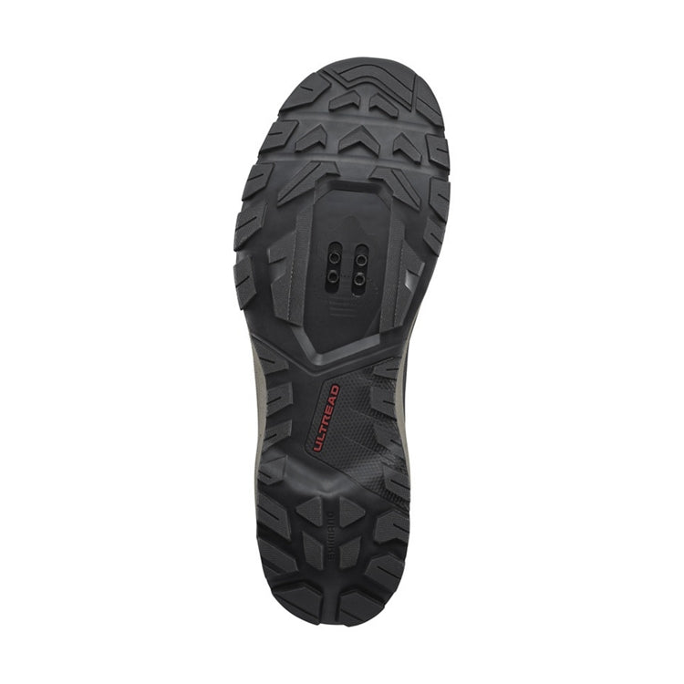 Close up of black rubber sole, SPD, 'Ultread' branding, bottom view
