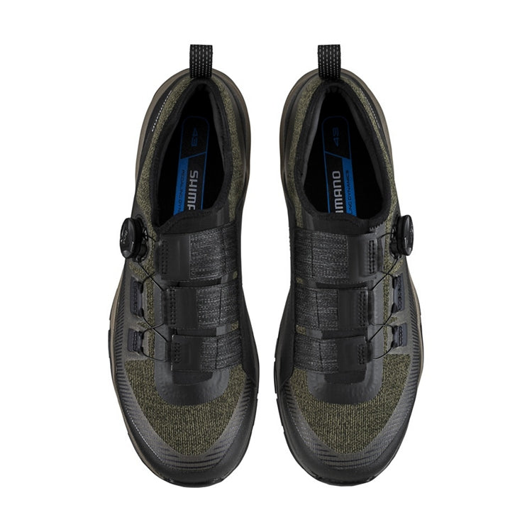 A pair of olive shoe with one black BOA dial on each side, top view