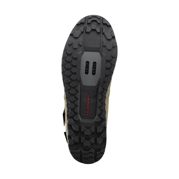 Close up of black rubber sole with SPD, 'Ultread' branding, bottom view