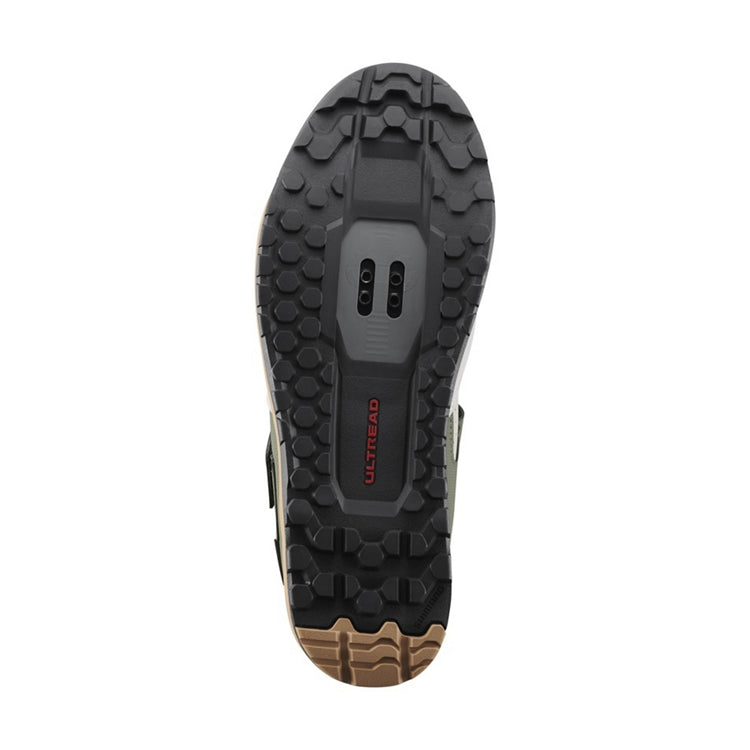 Close up of black and tan rubber sole with SPD, 'Ultread' branding, bottom view