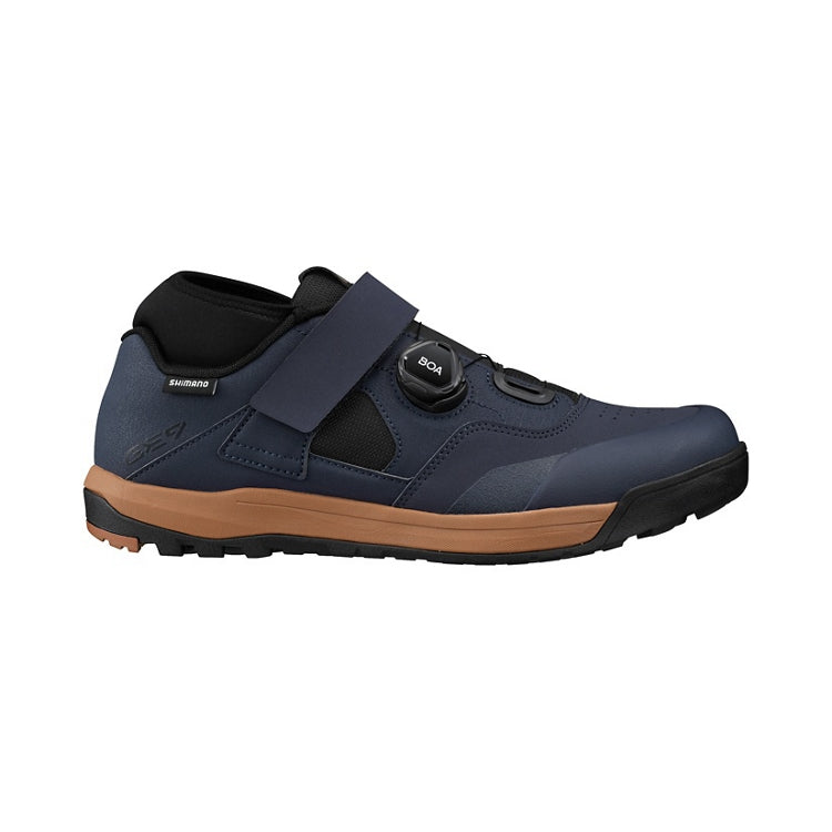Midnight navy shoe with tan and black sole, one black BOA dial and navy strap, right view