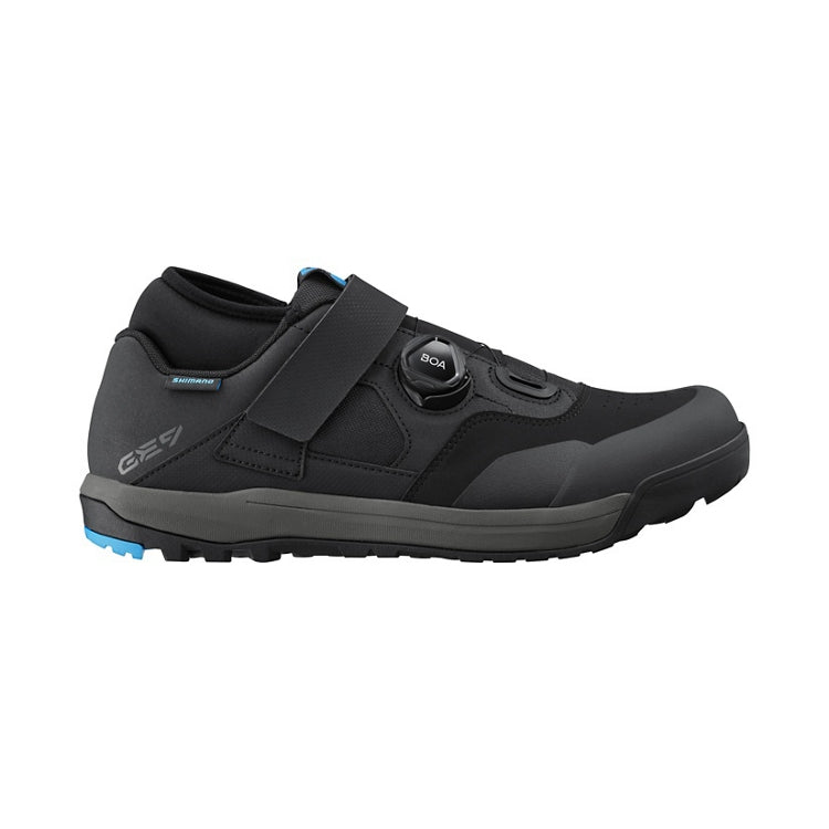 Black shoe with blue and black sole, one black BOA dial and black strap, right view