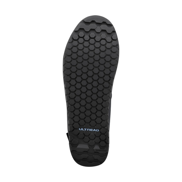 Close up of black rubber sole of a shoe with 'Ultread' logo 