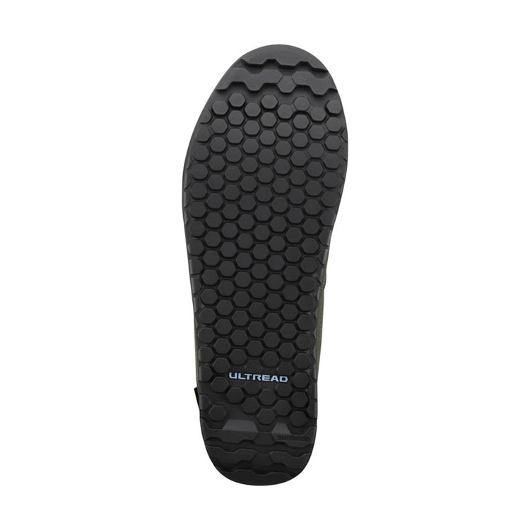Close up of black rubber soles with 'Ultread' branding 