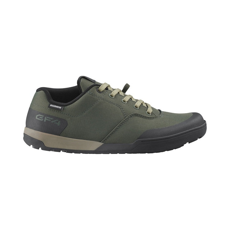 Green shoes with laces, black sole, right view