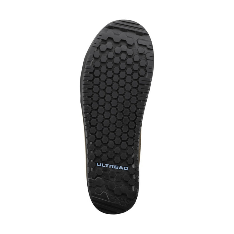 Closeup of black sole of a shoe with 'ULTREAD' branding