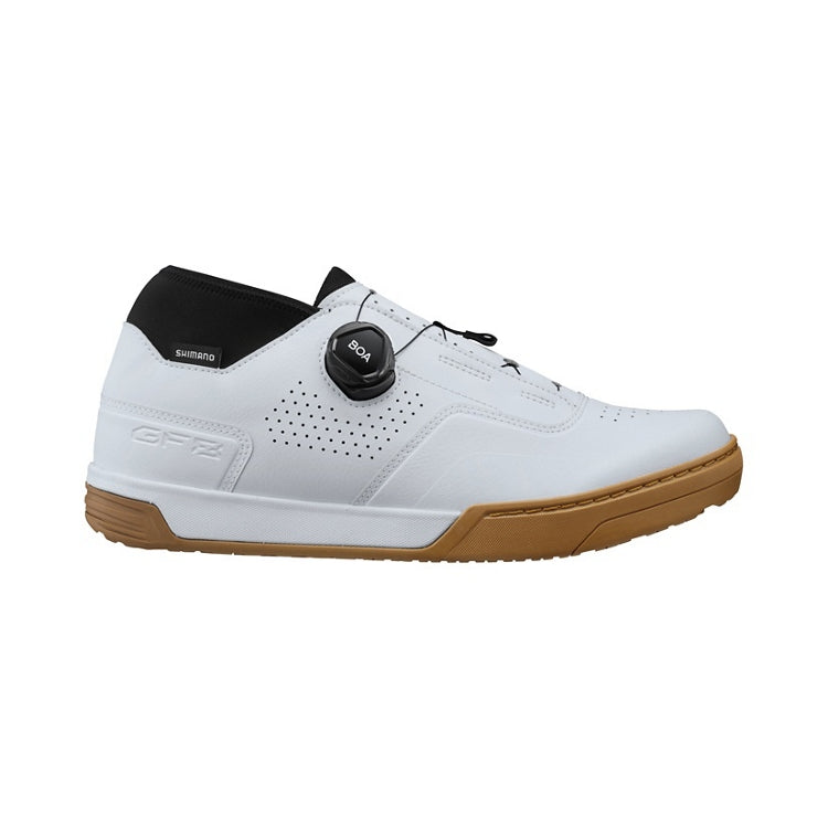White cycling shoe with tan sole and black BOA dial, right view