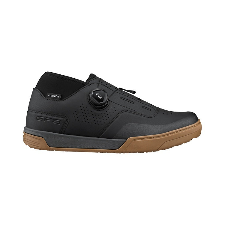 Black cycling shoe with tan sole and black BOA dial, right view