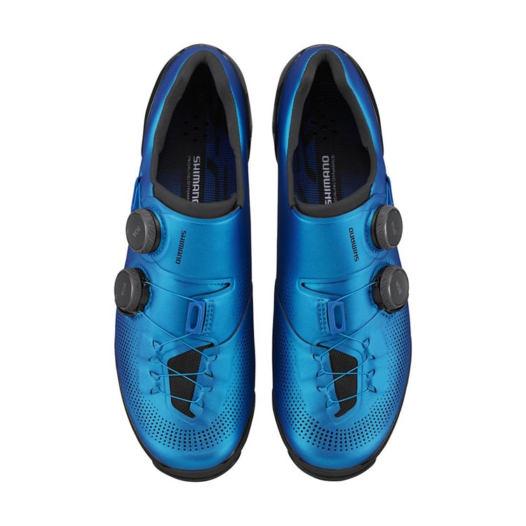 Pair of blue Shimano cycling shoes with 2 black BOA dials on each side with Shimano logo, top view