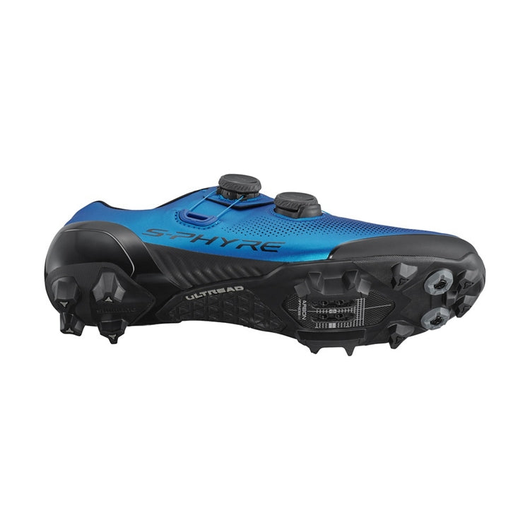 Blue cycling shoe with black accents, S-PHYRE wordings with 2 black BOA dials, black rubber sole base, bottom view