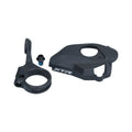 Shimano XTR bicycle shifter mount kit components, including a black handlebar clamp, mounting screw, and XTR-branded cover plate, displayed against a light gray background.